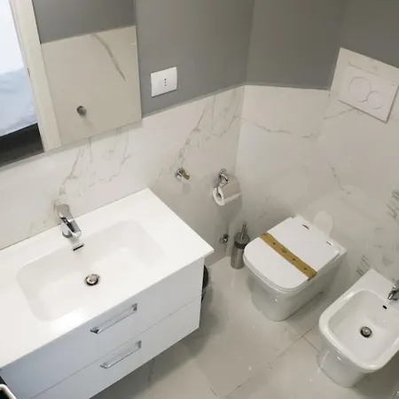 Asso Stazione Apartmanhotel