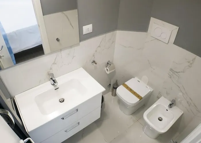 Asso Stazione Apartmanhotel